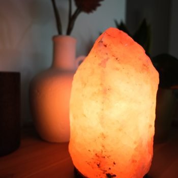 a himalayan salt lamp sitting on a table